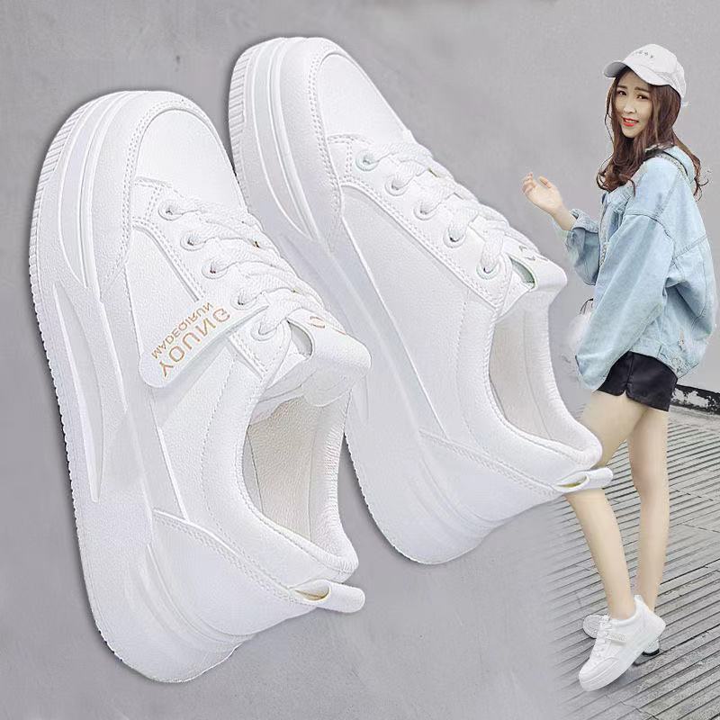 Tenis blancos best sale con suela gruesa