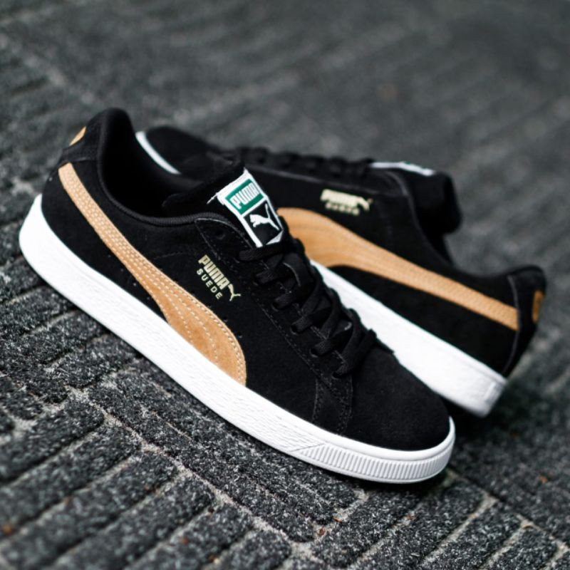 Puma blancas suela marron best sale