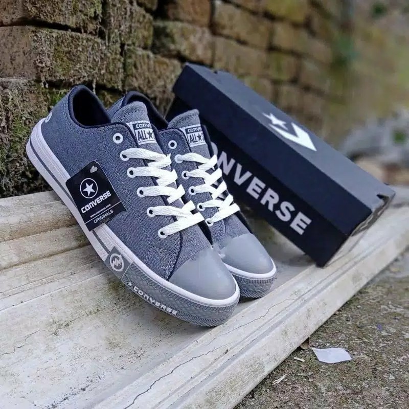 Converse grises hotsell hombre mujer