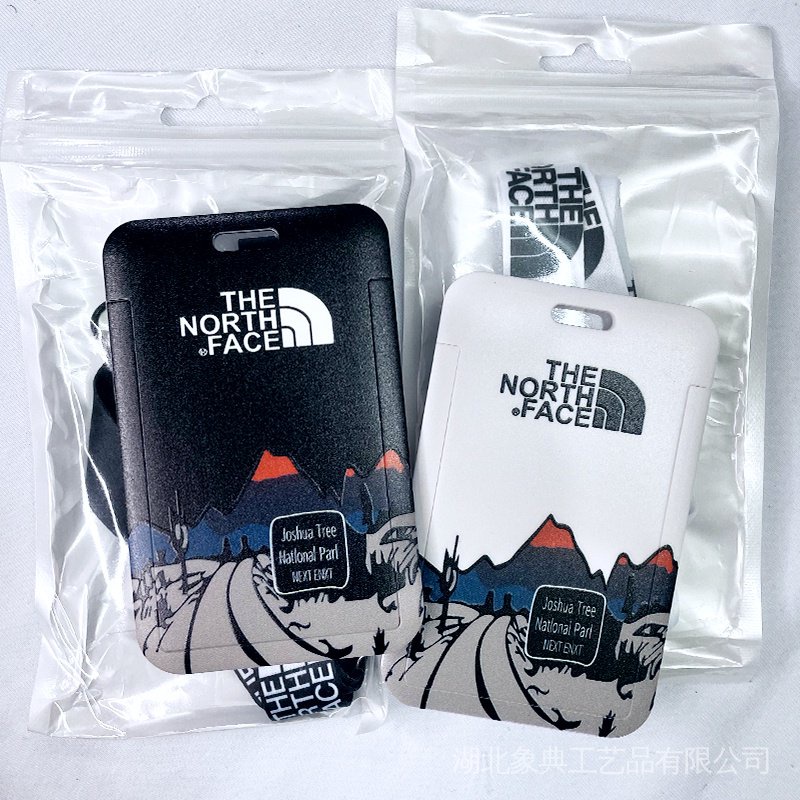 The North Face lanyard card sleeve Tarjetero Negro Blanco Cubierta