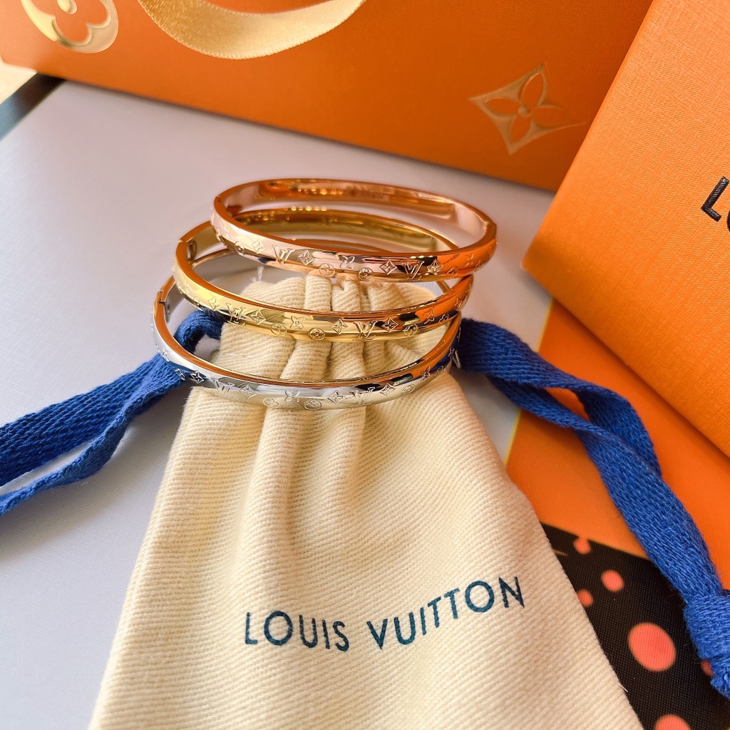 LV light luxury titanium steel Incrustaciones De Letras Louis