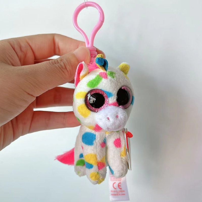 Fashion peluche unicornio ojos brillantes