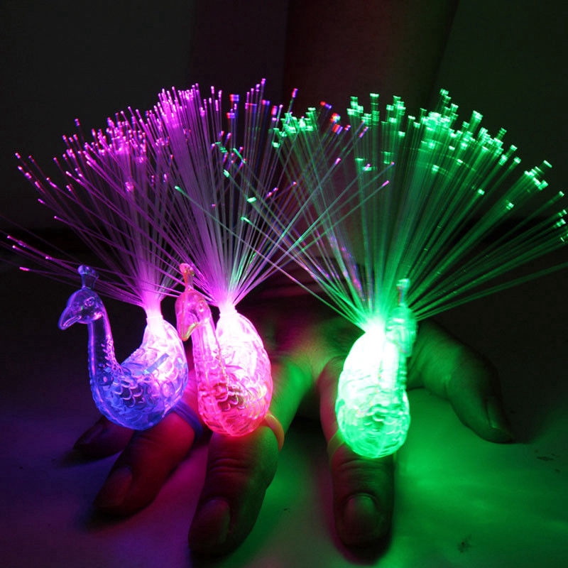 Ilumina la fiesta con esta colorida luz LED de dedo de pavo real un regalo divertido para los ninos