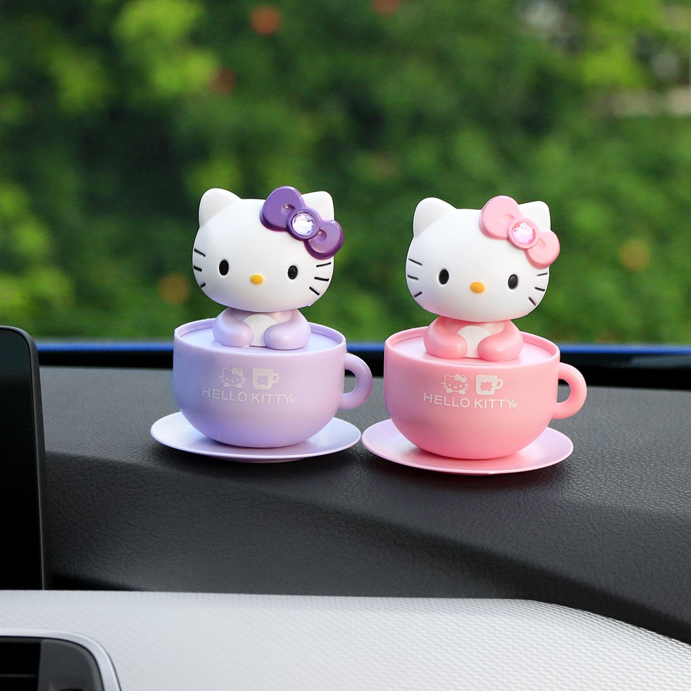 Hello Kitty sacudiendo la cabeza de energía Solar accesorios de coche  adorno escritorio encantadora muñeca de alta popularidad