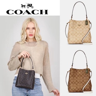 Cartera de mano discount coach