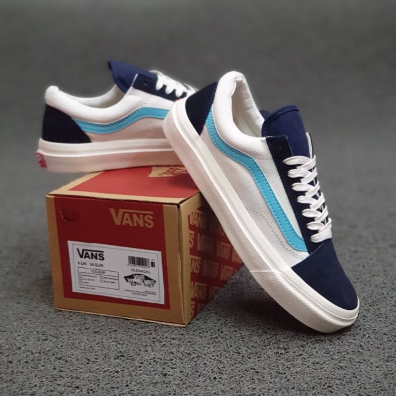 Vans blancos 2025 con azul