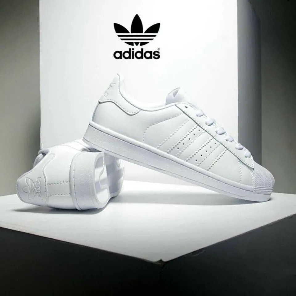 Tenis adidas best sale con alas dorados