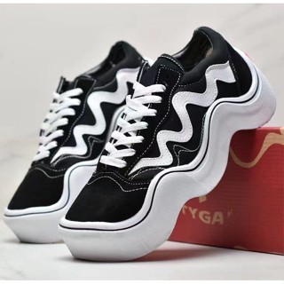 Vans negras suela discount alta