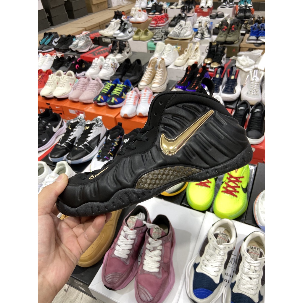 Gold and cheap black foamposite