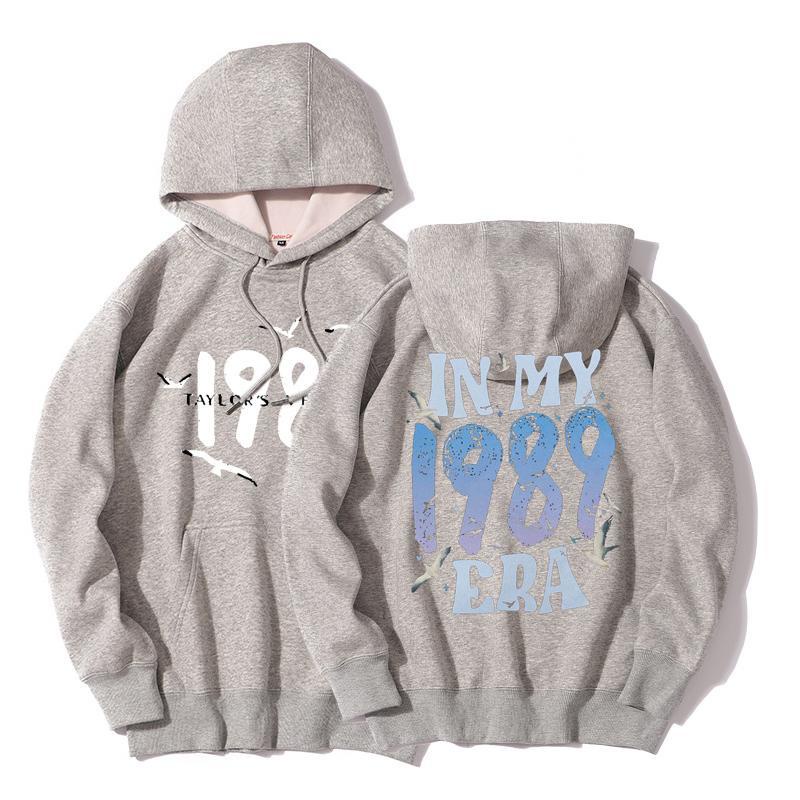 thumbnail image 1 of 2023 Nuevo Taylor Swift 1989 The Eras Tour Concert Merch Hombres/Mujeres Sudadera Con Capucha Diseño Ayuda Ropa Misma Unisex Streetwear Chamarra Top, 1 of 5
